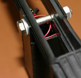 Top view of the magazine holder, wires and on/off switch